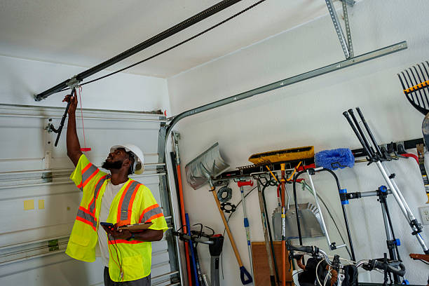 Professional Garage Door Panel Replacement technician working in Schenectady County County, NY